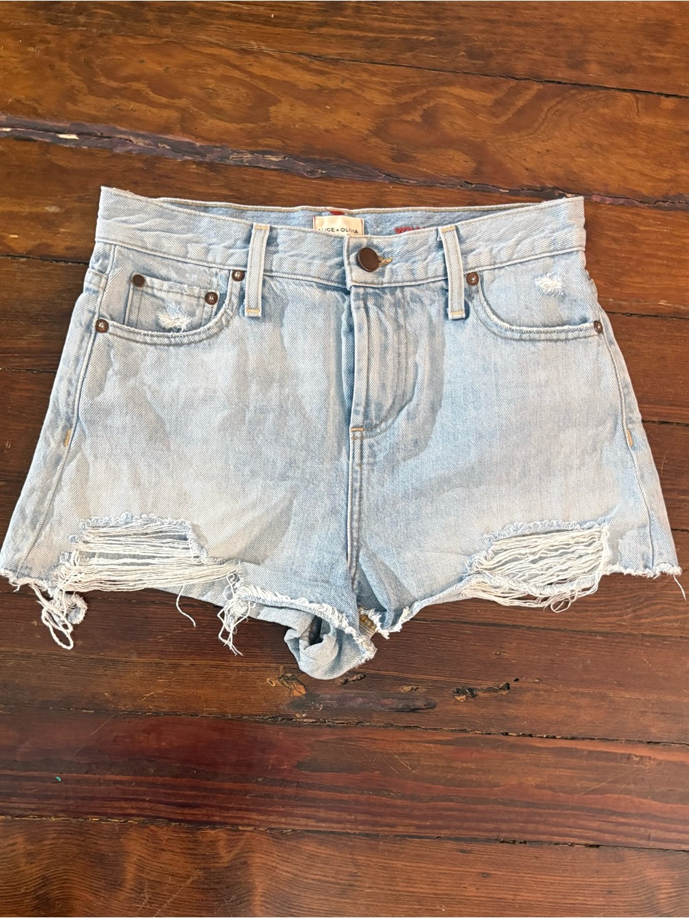 Alice and Olivia light wash blue Jean denim cutoff shorts size 26
